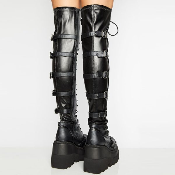 Over-the-knee boots with a raised platform