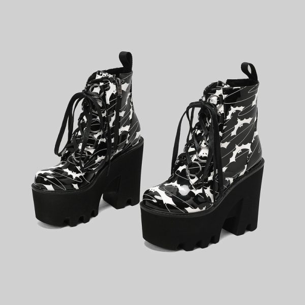 Ankle boots with bat style imprint design