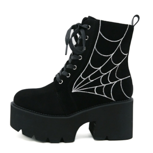 Ankle suede boots with a spider web design on the side