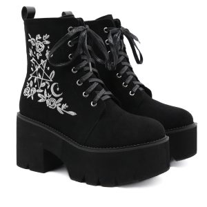 Ankle suede boots with embroidered design on the side