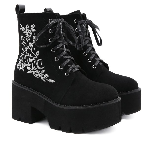 Ankle suede boots with embroidered design on the side