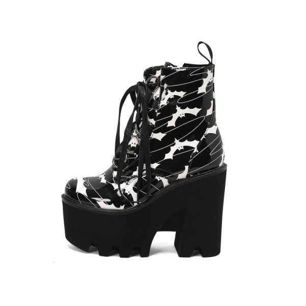 Ankle boots with bat style imprint design
