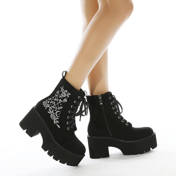 Ankle suede boots with embroidered design on the side