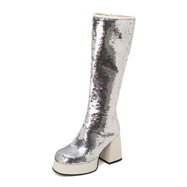 Silver boots with a platform and block heel
