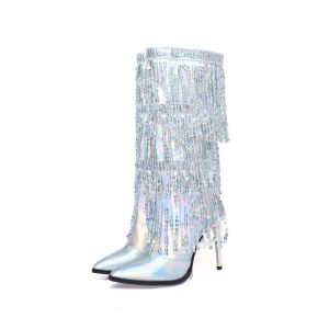 Pointy knee-high boots with fringes